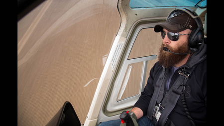 Robert Thiel of Thiel AirCare, Inc. in Chowchilla, Calif., pilots his helicopter over brown fields in the western San Joaquin Valley. His family’s crop dusting business would usually be spraying these fields at this time of year. Doug Thiel, his father and owner of the business, said 'We’re probably at 20 to 25 percent of normal operation for the winter months' due to reduced planting by farmers because of ongoing drought. 'It’s really kind of bleak,' he said of his outlook for the spring and summer seasons.