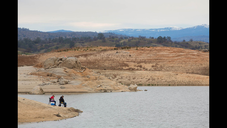 In a normal year, 'This would all be underwater,' said Tony, fishing for trout with his wife Darlene at the Hensley Lake reservoir near Madera, Calif. on Sat. Feb 15. Hensley Lake is at just seven percent of capacity. 'That's why I'm fishing now, because I don't think there's going to be water in summer.'