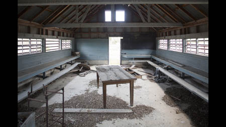An old 'dog house,' where miners would change clothes after work, stands in central Picher. In 1927, according to local history buff Ed Keheley, 40% of miners in Picher had silicosis, a lung condition caused by dust inhalation, and in 1934 the town had the highest rate of tuberculosis in the country.