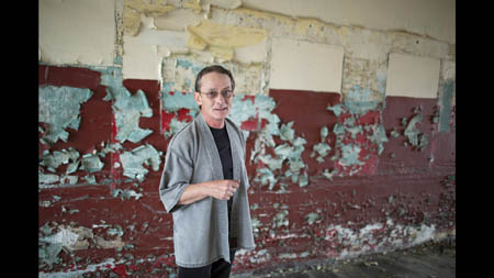 'I painted these walls,' said David Ray, 62, standing in the pool hall his dad Hoppy operated in Picher from 1963 to 2009. Ray grew up in Picher and remembers playing with lead as a child: 'It was everywhere. It was heavy and it looked neat and it had a tangy taste. When I was a kid I'd put lead in a coffee grinder. And put it all over myself. We'd swim in cave-ins that were filled with water.' Ray wonders if his school troubles (his two weeks in college were 'the most embarrassing and humiliating experience of my life') and health problems (cataracts starting at age 30, and now chronic kidney disorder) are connected to his childhood lead exposure.